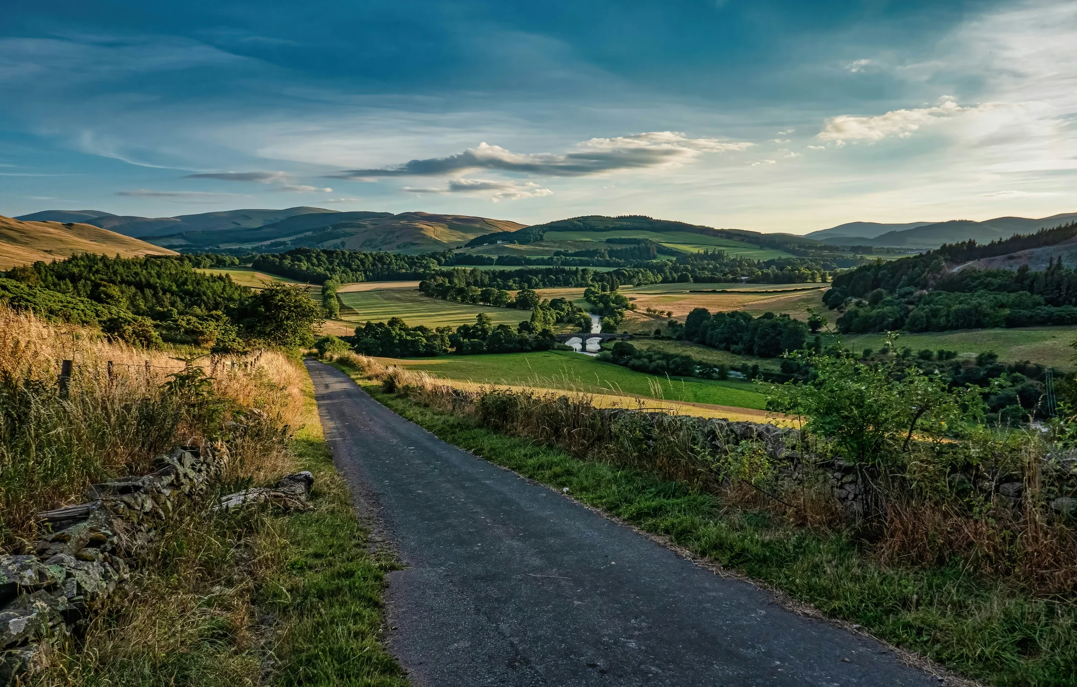 Quiet Ayrshire road running through open countryside between Cairnryan and Glasgow