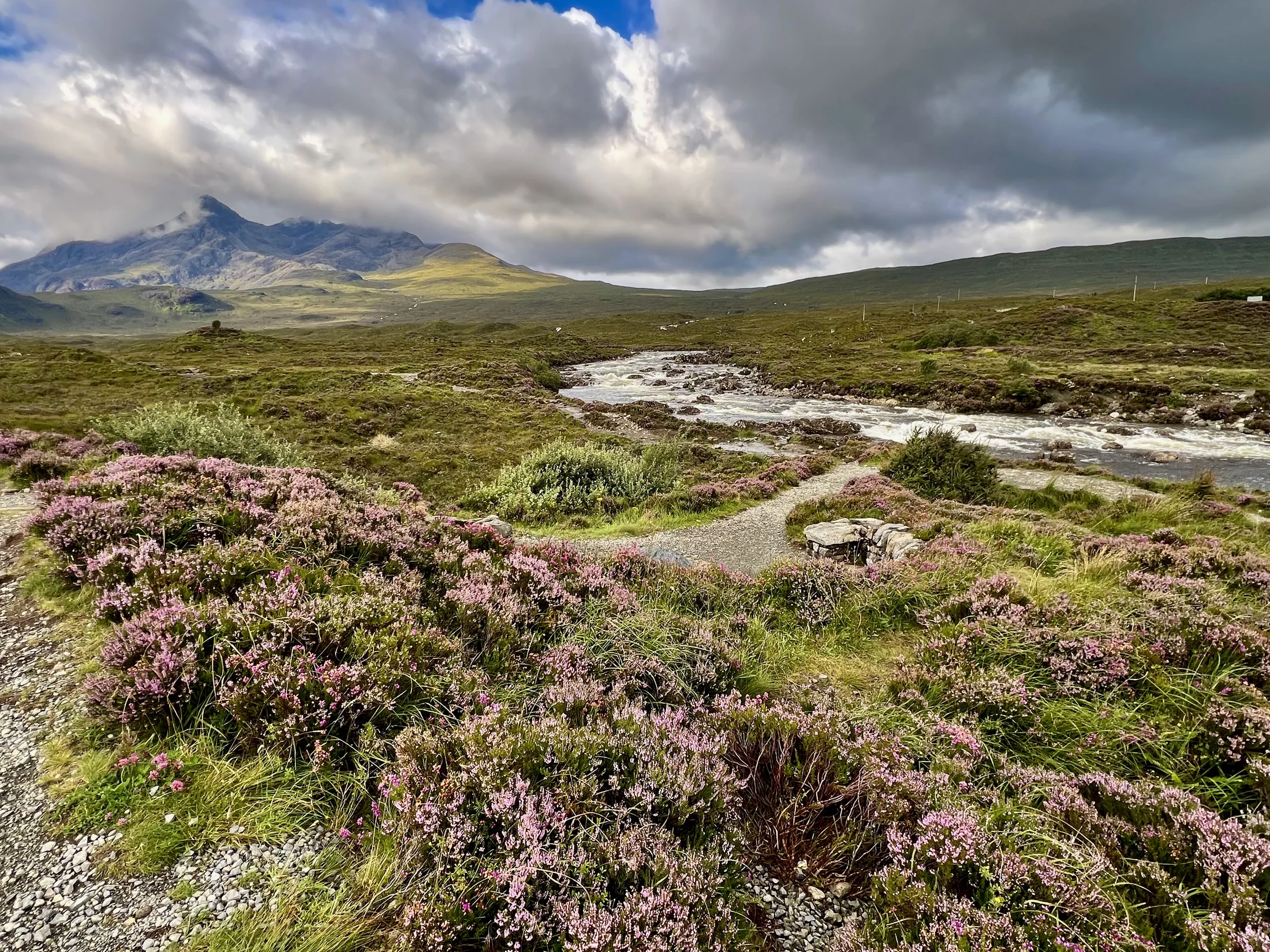 Heather and river landscape on the Isle of Skye