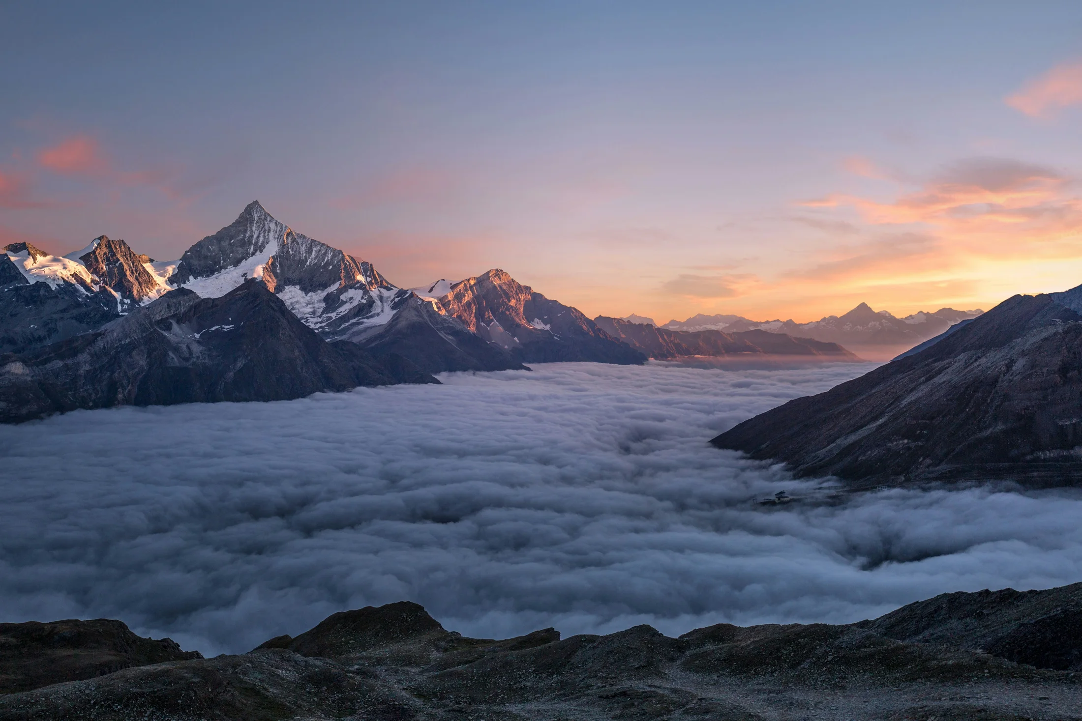 Sunrise over the Alps above a cloud inversion