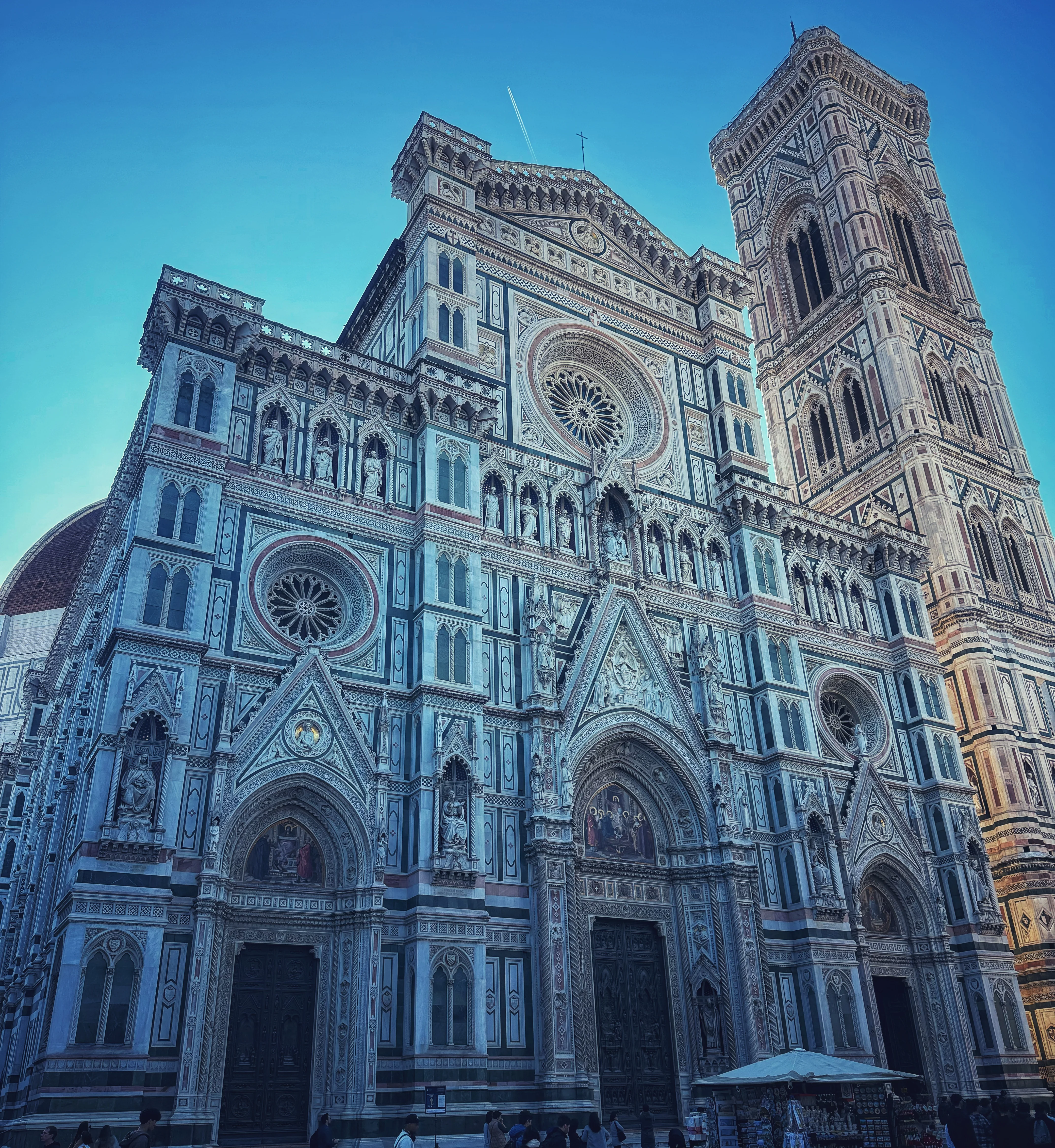 Florence Duomo facade against a clear blue sky