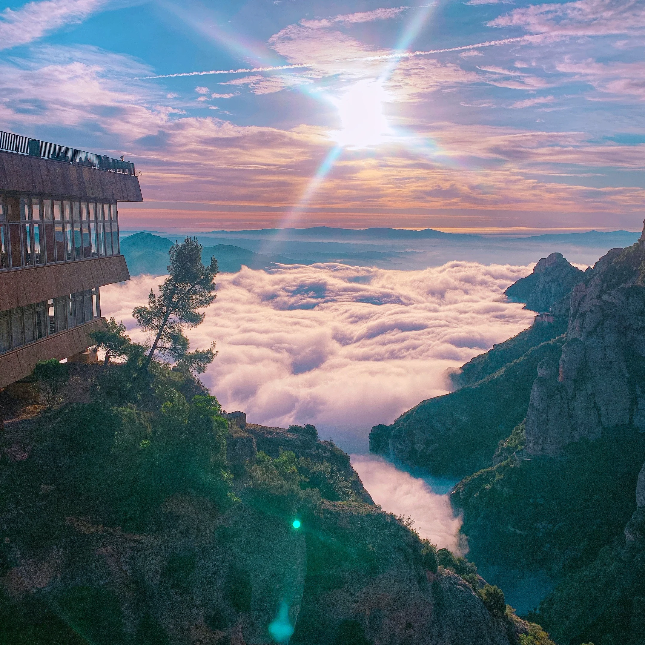 Montserrat above the clouds at sunrise
