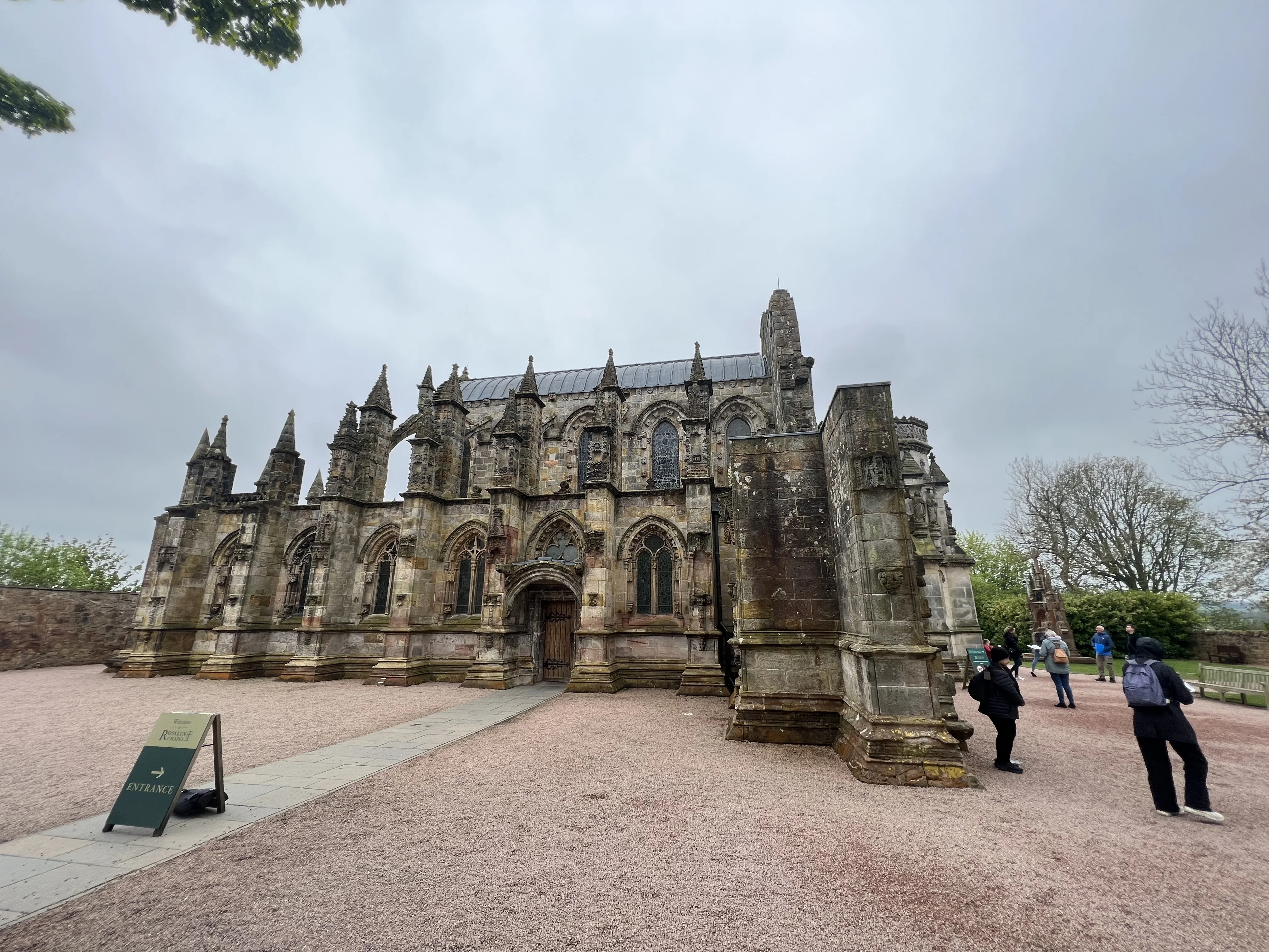 Rosslyn Chapel in Scotland under a soft grey sky